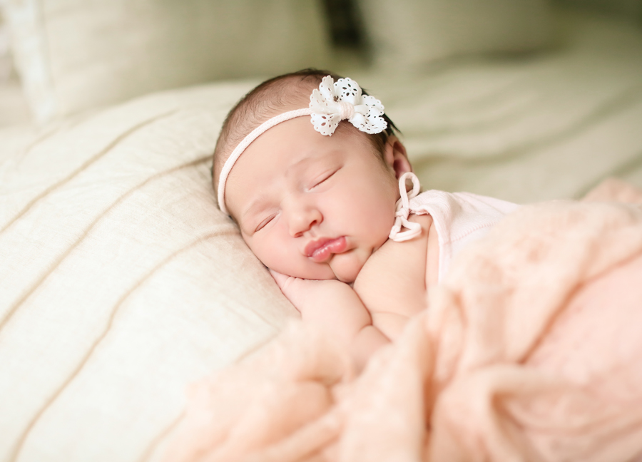 Newborn baby girl at an in-home newborn session in Chandler, Arizona 