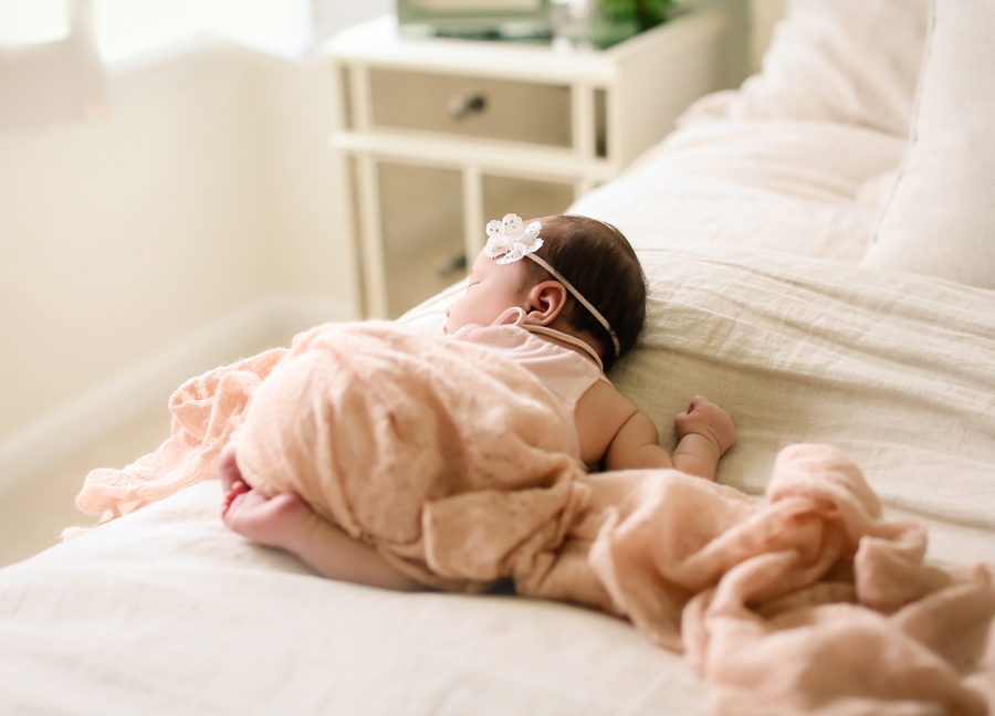 Posed sleeping baby girl at an in-home newborn session in Chandler, Arizona
