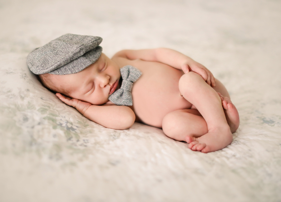 A posed baby boy at an in-home newborn session in Chandler, Arizona