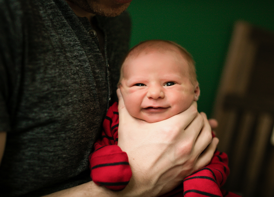Chandler Arizona baby photography: father burping his baby