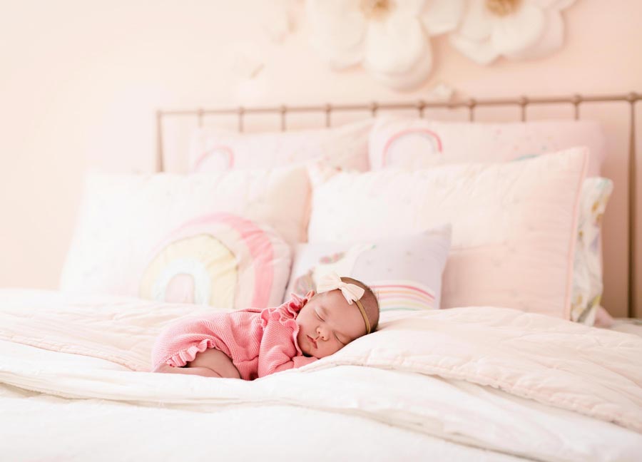 A sleeping baby girl captured by Ashburn newborn photographer, Stephanie Honikel.