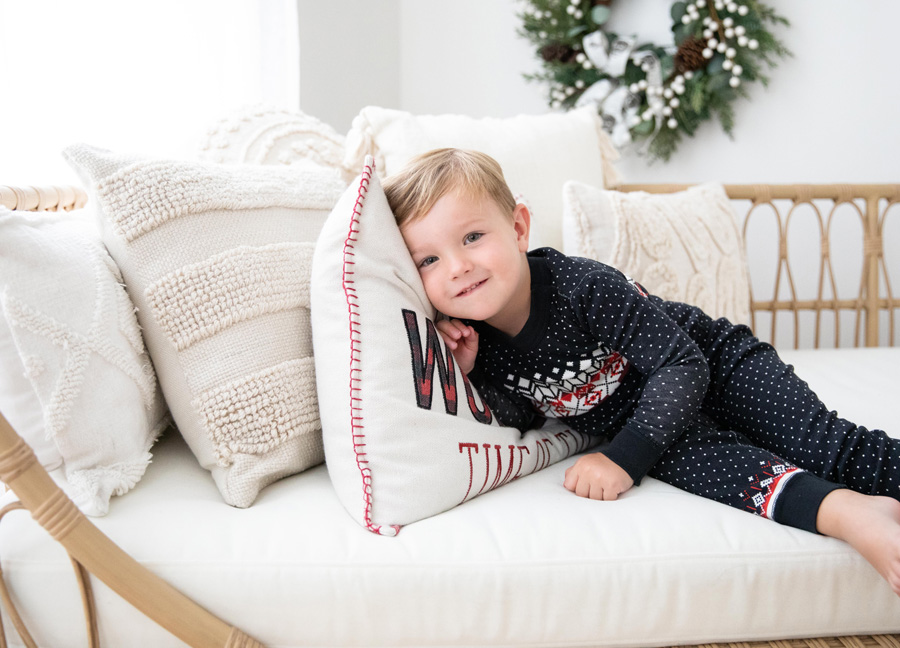 A little boy in his pajamas during a holiday mini session event in Northern Virginia