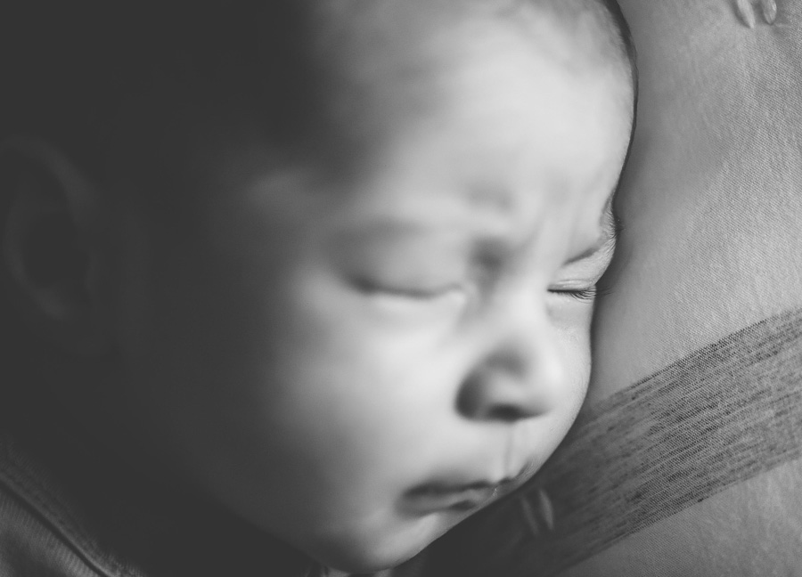 a newborn baby closing their eyes captured by a northern virginia newborn photographer