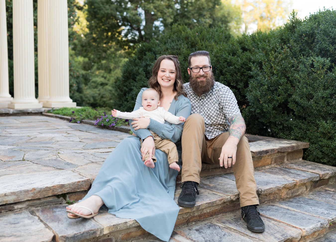 A family of three during a family session at Rust Manor in Leesburg, Virginia 
