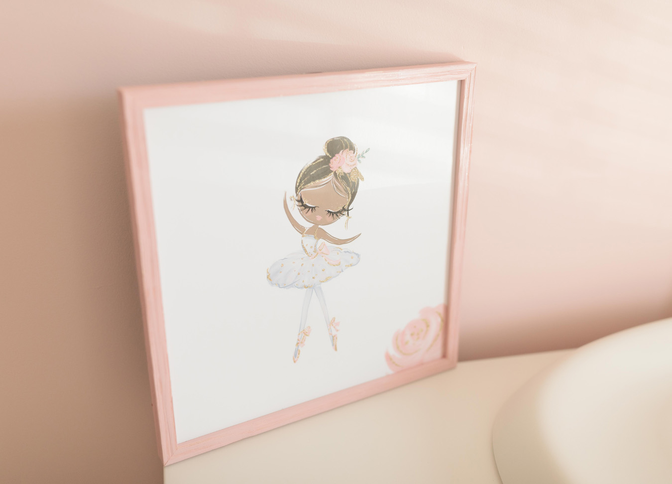 picture of a girl wearing a tutu in a pink frame