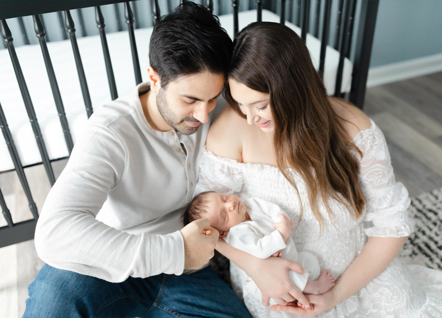 after your baby Shower in Washington D.C., you'll want to consider hiring a Washington D.C. Newborn photographer to capture photos of mom, dad, and baby sitting in the nursery