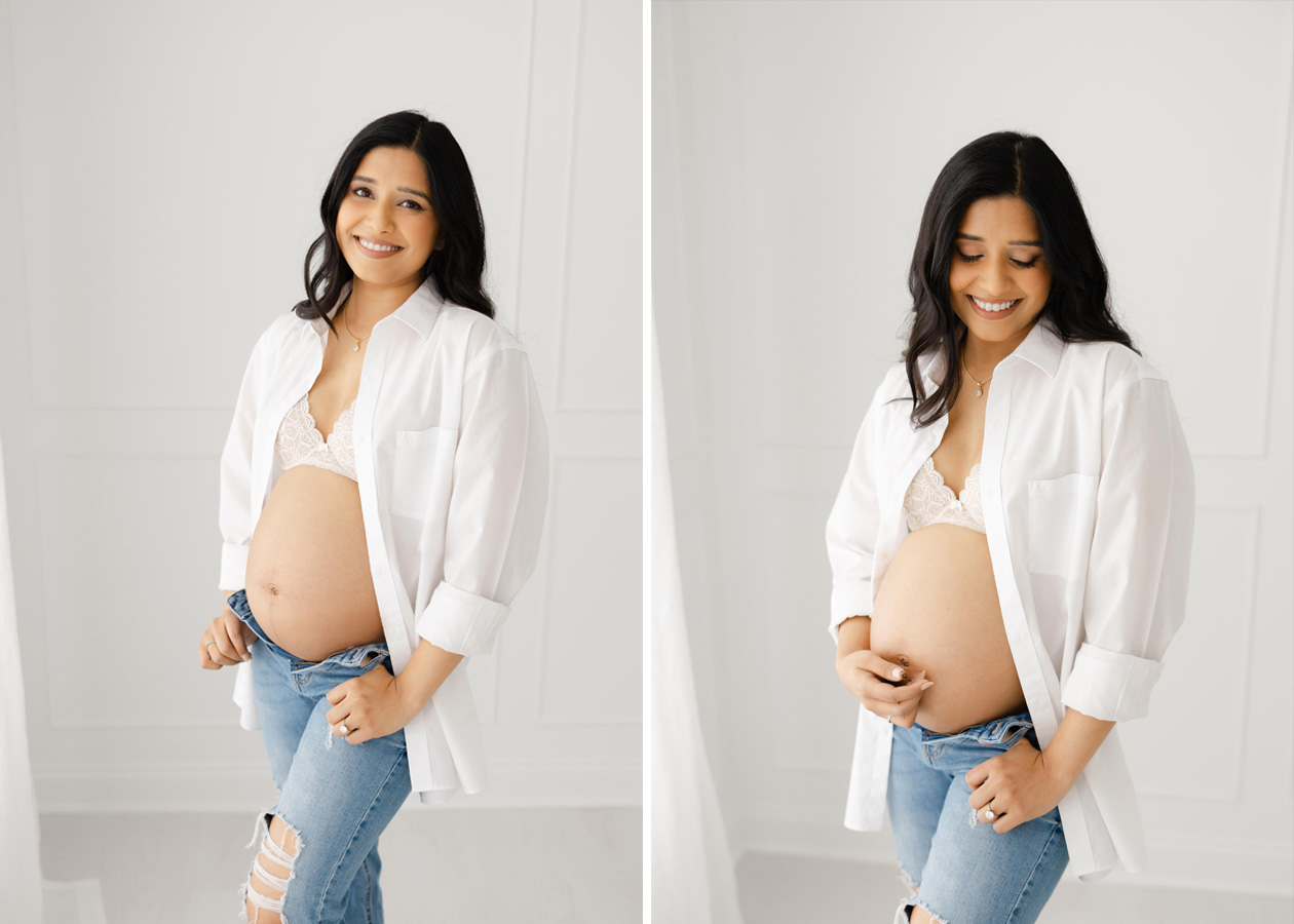 maternity photographer in D.C. captures a beautiful expecting mother wearing a pair of jeans and white button down top