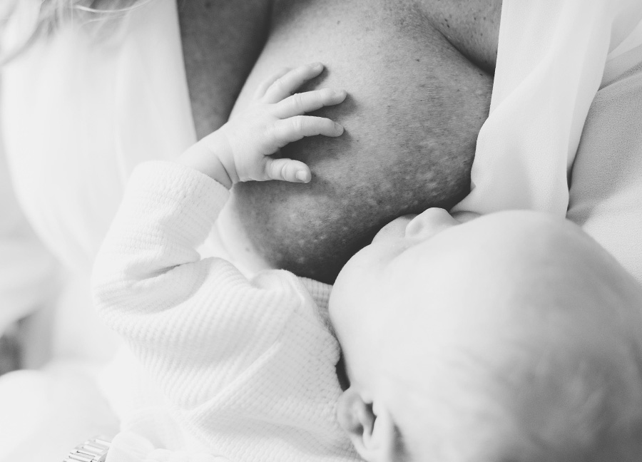 breastfeeding baby captured by a newborn photographer in Northern Virginia