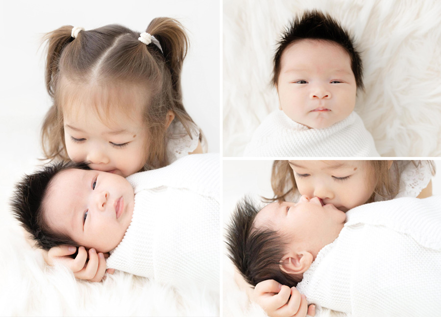 toddler and newborn baby during a newborn photography session in Washington D.C.