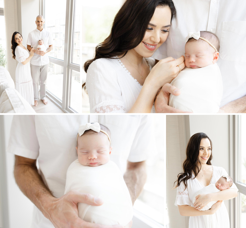 mother smiling and touching newborn while the father holds the newborn captured by a newborn photographer in Northern Virginia