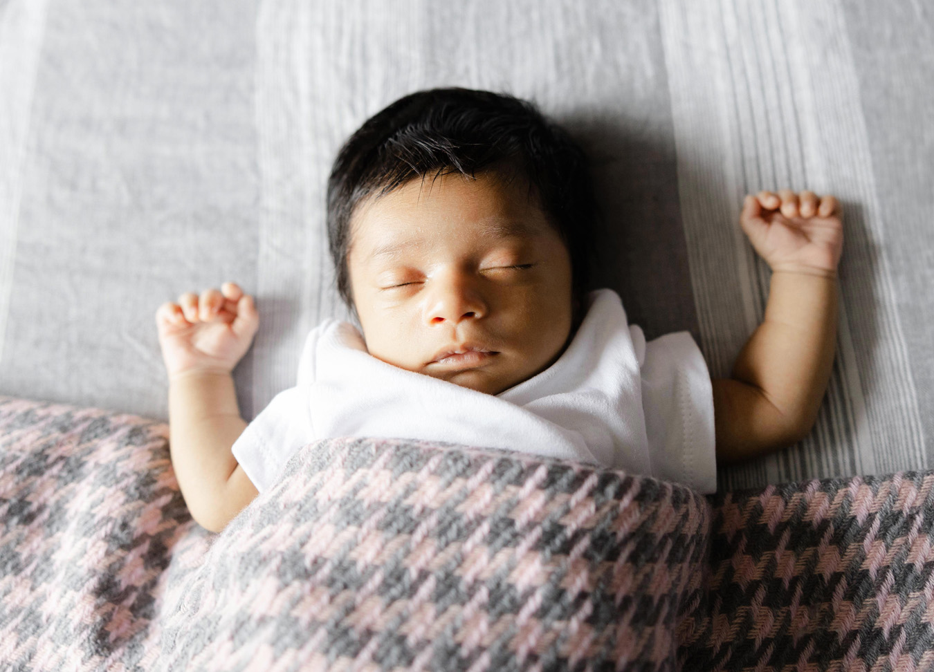 Best Ultrasound Clinic in Northern Virginia featuring a newborn baby sleeping