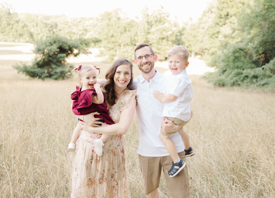 babymoon in Washington dc featuring a family posing together outdoors