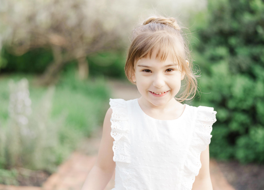 Private Preschools In DC featuring a girl smiling captured by a family photographer in DC