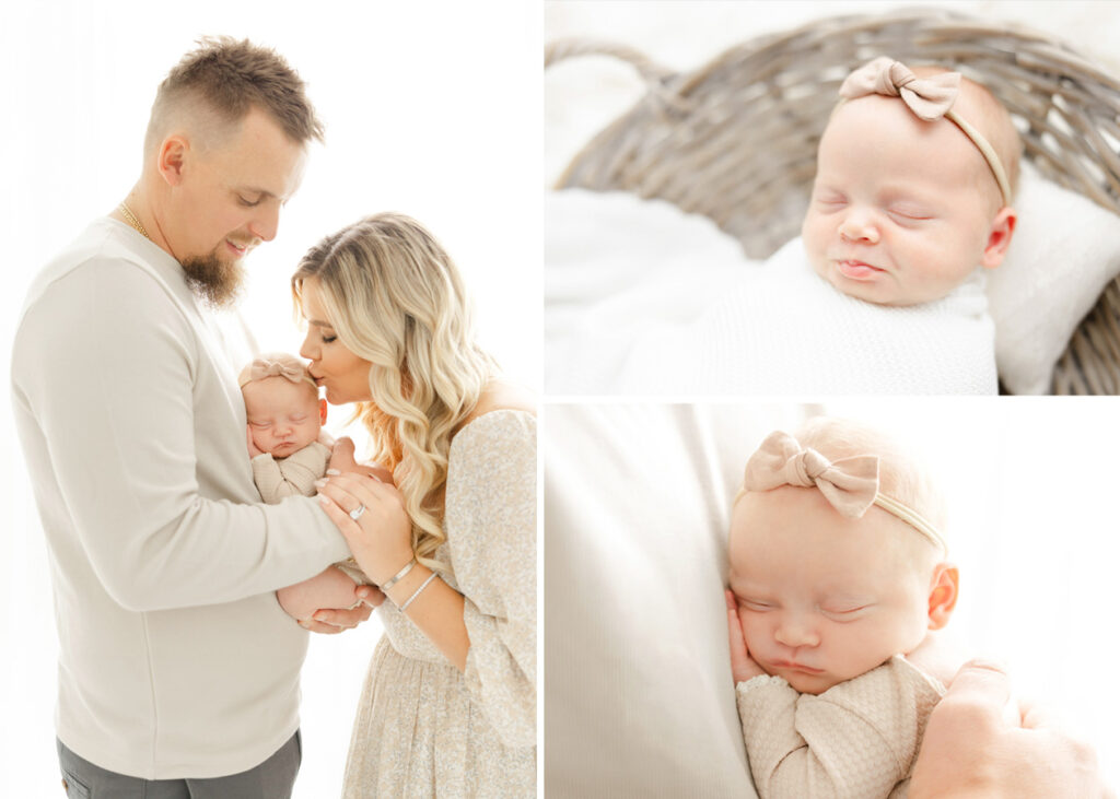 a man and woman with their newborn baby during a studio newborn session