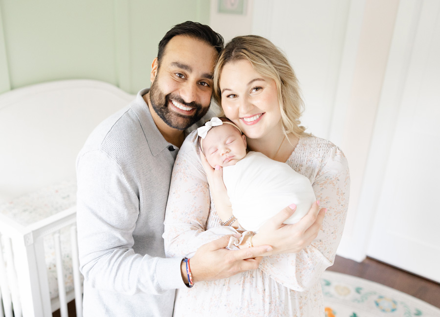 newborn photography session in Northern Virginia featuring a mom, dad and newborn baby