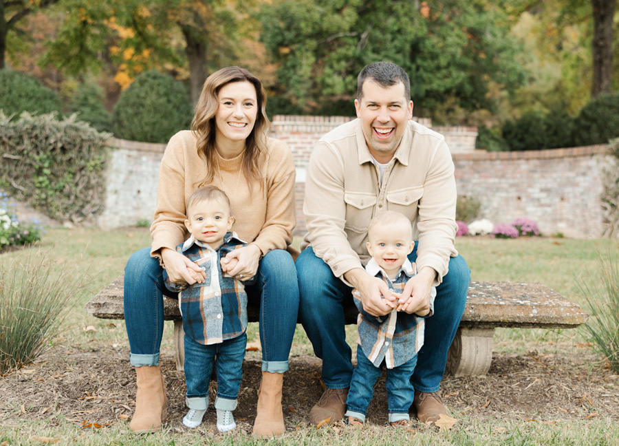 family of four smiling and captured by a northern virignia family photographer