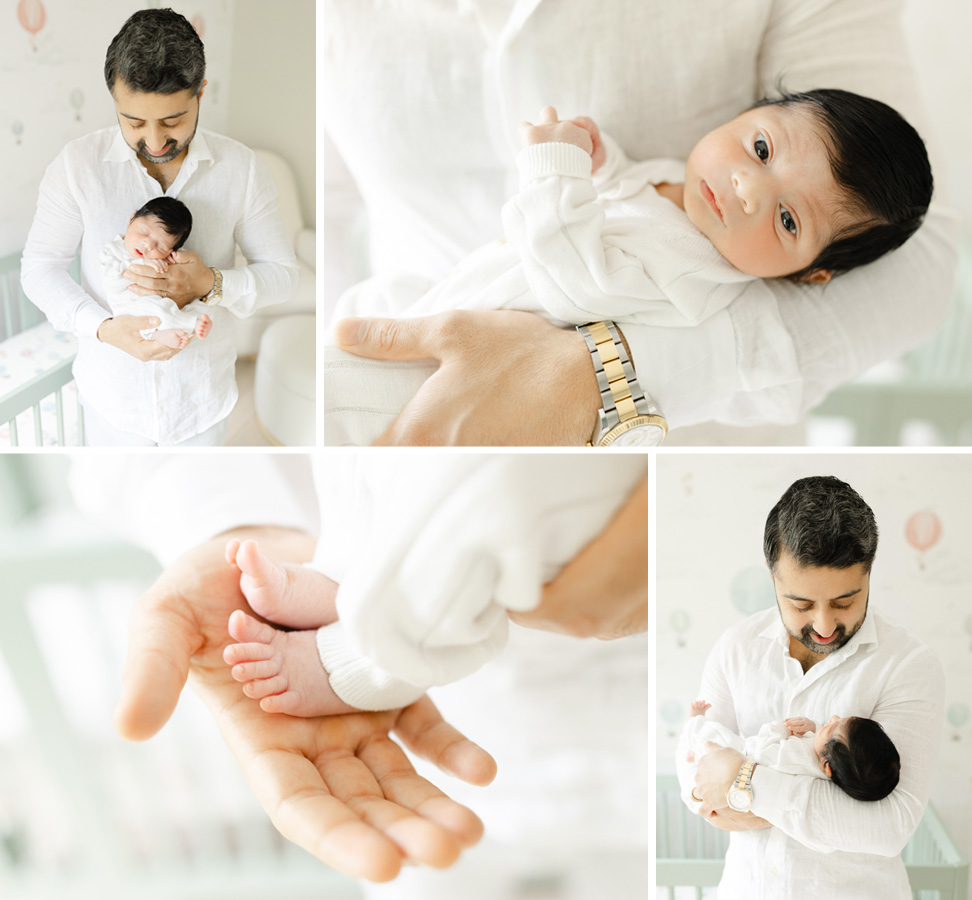 A new father dressed in neutral clothing bonding with his newborn in a soft, neutral-toned nursery during a cozy in-home session.